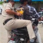 रीवा27जुलाई26*नियम तोड़ती रीवा पुलिस: ट्रिपलिंग कर बाइक पर ले गए आरोपी, वायरल वीडियो पर उठे सवाल*